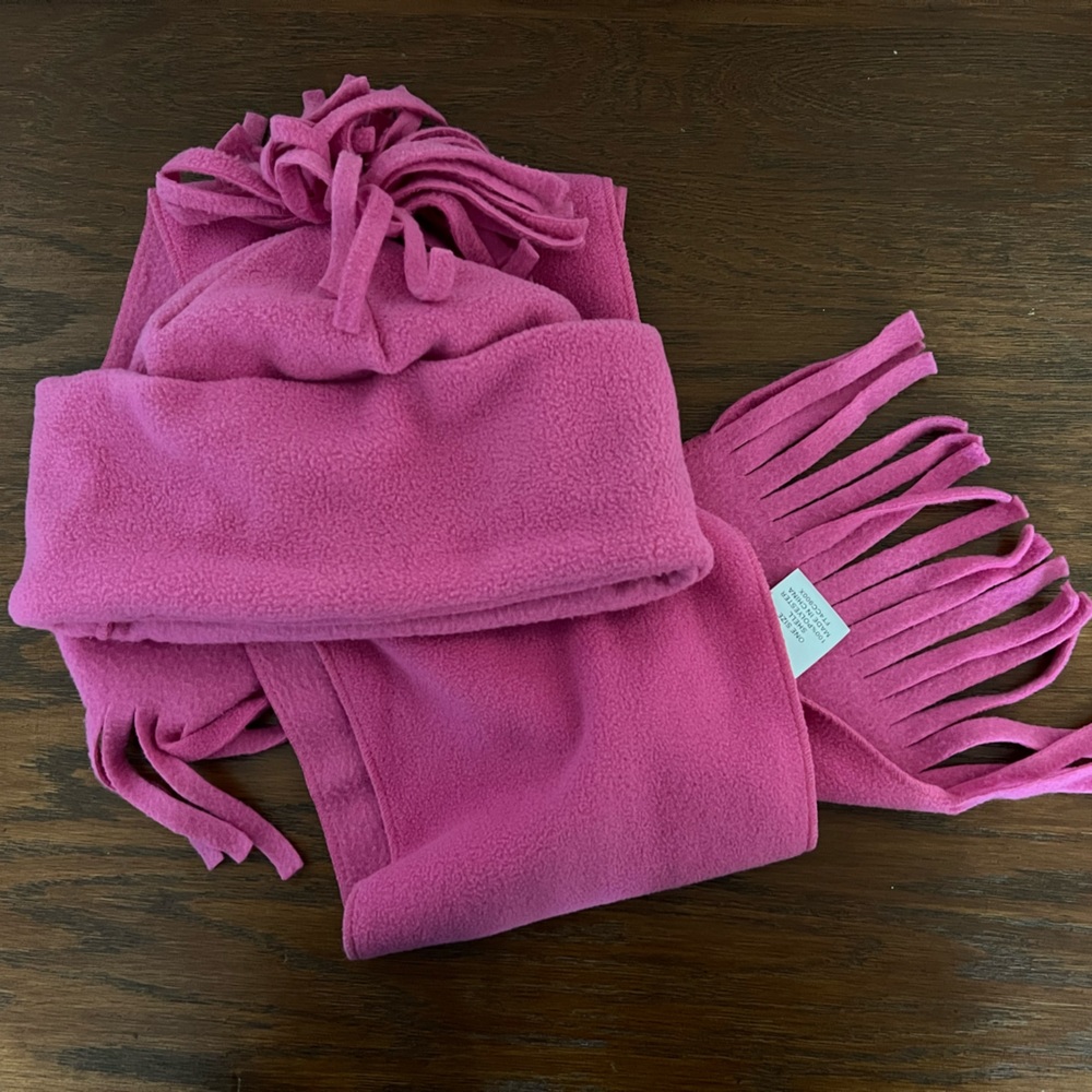 Gently used hot pink beanie and scarf set. No brand.
